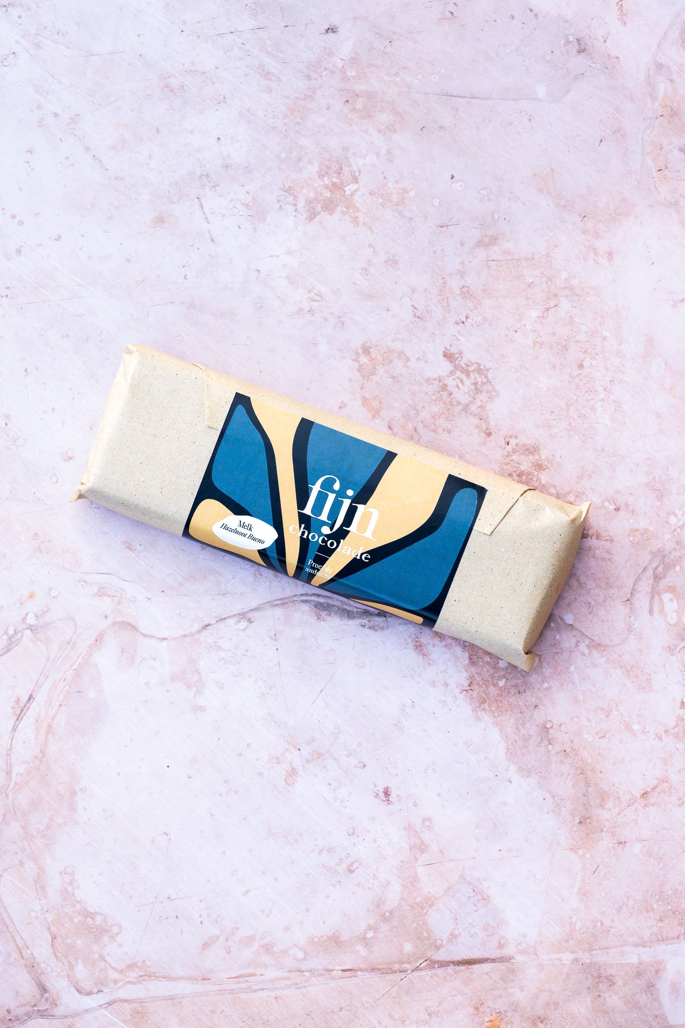 Ambachtelijke melkchocolade met hazelnoot bueno vulling | 200 gram